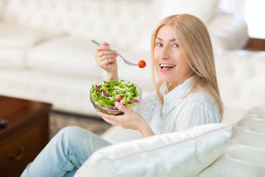 healthy eating salad older woman